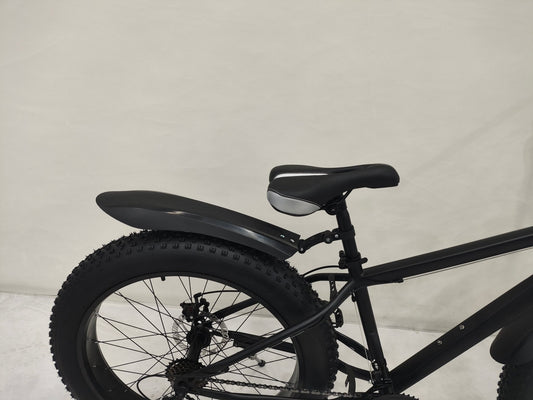 Deviant 26 inch fat tire bike side view on beach
Close-up of Shimano gear and disc brakes
All-terrain mountain bike with wide tires
Fat bike for snow, sand, and trails - Deviant 26 inch