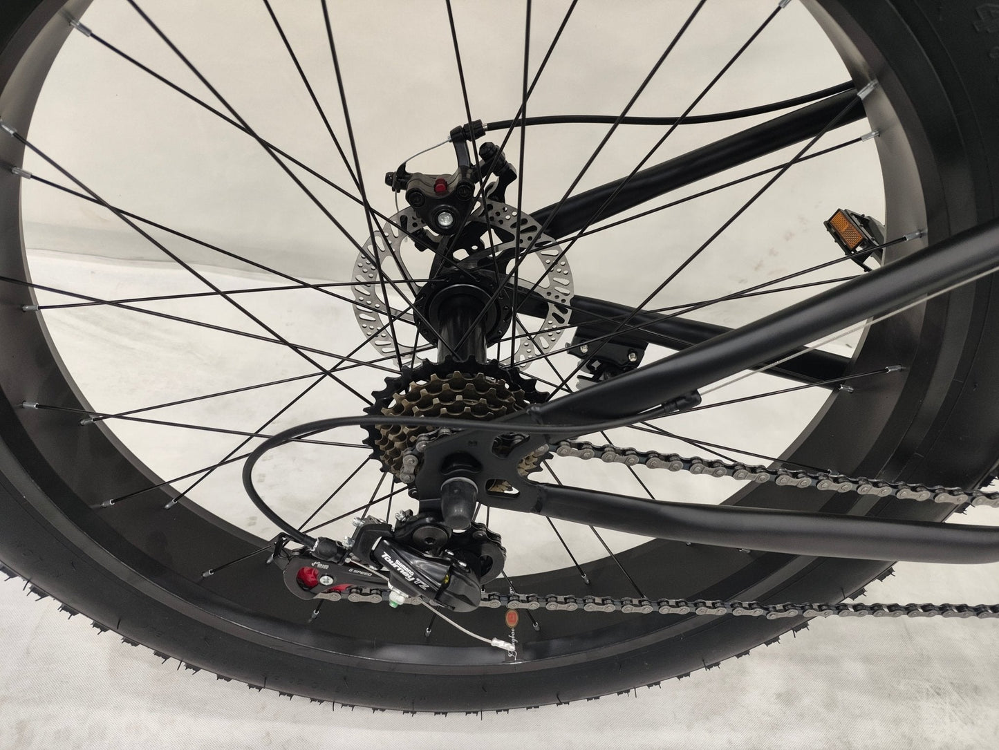 Deviant 26 inch fat tire bike side view on beach
Close-up of Shimano gear and disc brakes
All-terrain mountain bike with wide tires
Fat bike for snow, sand, and trails - Deviant 26 inch