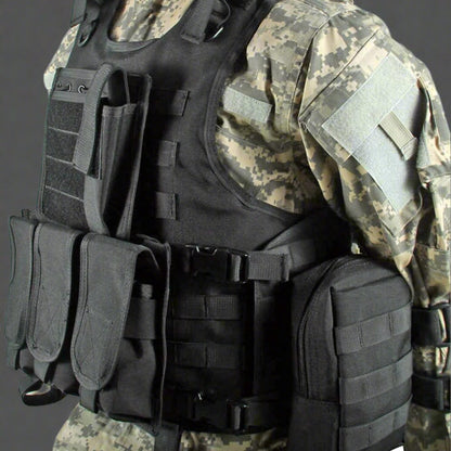 Black Tactical MOLLE Vest – Front View

Tactical Vest Worn by Model – Side View

Adjustable Combat Vest – Straps and Buckles Detail

MOLLE System Tactical Vest – Rear View

Tactical Vest in ACU and A-TACS Camo – Group Display