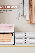 Foldable white storage bins neatly organizing a bedroom closet