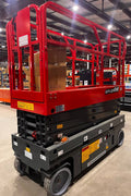 GTJZ08 Electric Scissor Lift full view in warehouse

Platform view showing foldable guardrails

Lift extended to 10M with worker on platform

Side profile highlighting tire system

Control panel and safety features close-up