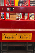 GTJZ08 Electric Scissor Lift full view in warehouse

Platform view showing foldable guardrails

Lift extended to 10M with worker on platform

Side profile highlighting tire system

Control panel and safety features close-up