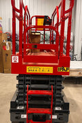 GTJZ08 Electric Scissor Lift full view in warehouse

Platform view showing foldable guardrails

Lift extended to 10M with worker on platform

Side profile highlighting tire system

Control panel and safety features close-up