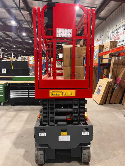 GTJZ08 Electric Scissor Lift full view in warehouse

Platform view showing foldable guardrails

Lift extended to 10M with worker on platform

Side profile highlighting tire system

Control panel and safety features close-up