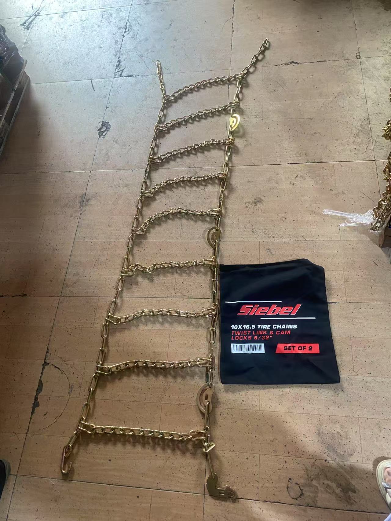 Heavy Duty Bobcat Skid Steer Tire Chains – 10x16.5 & 12x16.5 | Twist & Square Link - with SLTC12165 – 12x16.5 Twist Link Tire Chains | Sold by Uncle Wiener's Wholesale