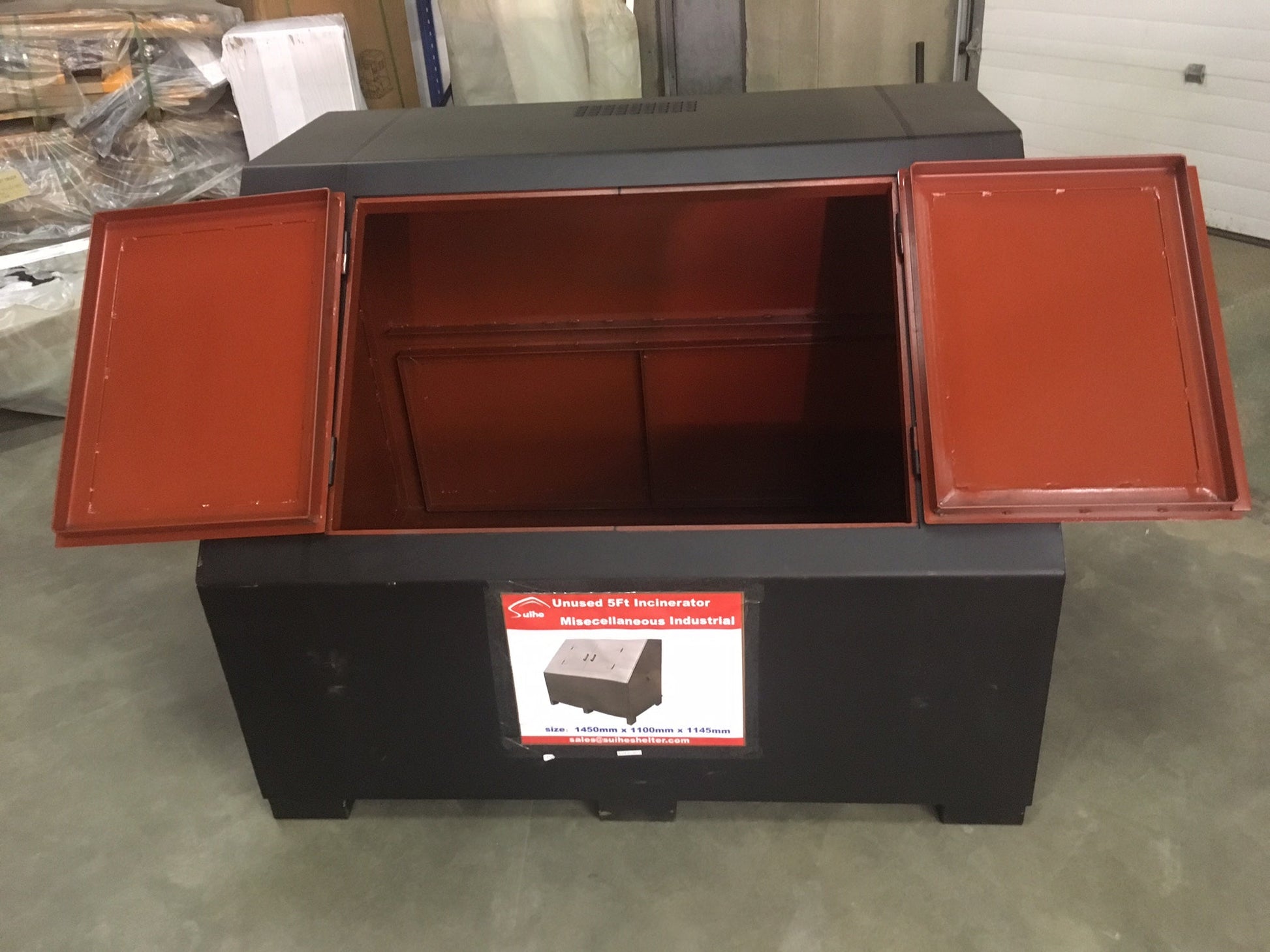 “Top view of black steel garbage incinerator fire pit with vent holes”

“Steel incinerator box with forklift access and reinforced lid”

“High-efficiency vented garbage burner with heavy-duty design”

“Open view of fire pit incinerator showing internal air grates”

“Steel waste disposal incinerator with front-loading forklift pockets”