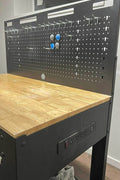 Heavy - Duty Steel Workbench with Power Strip, Drawer & Pegboard – Model WT006B - with | Sold by Uncle Wiener's Wholesale