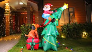 LED Christmas Yard Inflatables – Outdoor Holiday Decoration Blow - Ups - Christmas Inflatable Yard Decorations (LED, Outdoor Use) with 6 FT Inflatable Santa Climbing Tree | Sold by Uncle Wiener's Wholesale