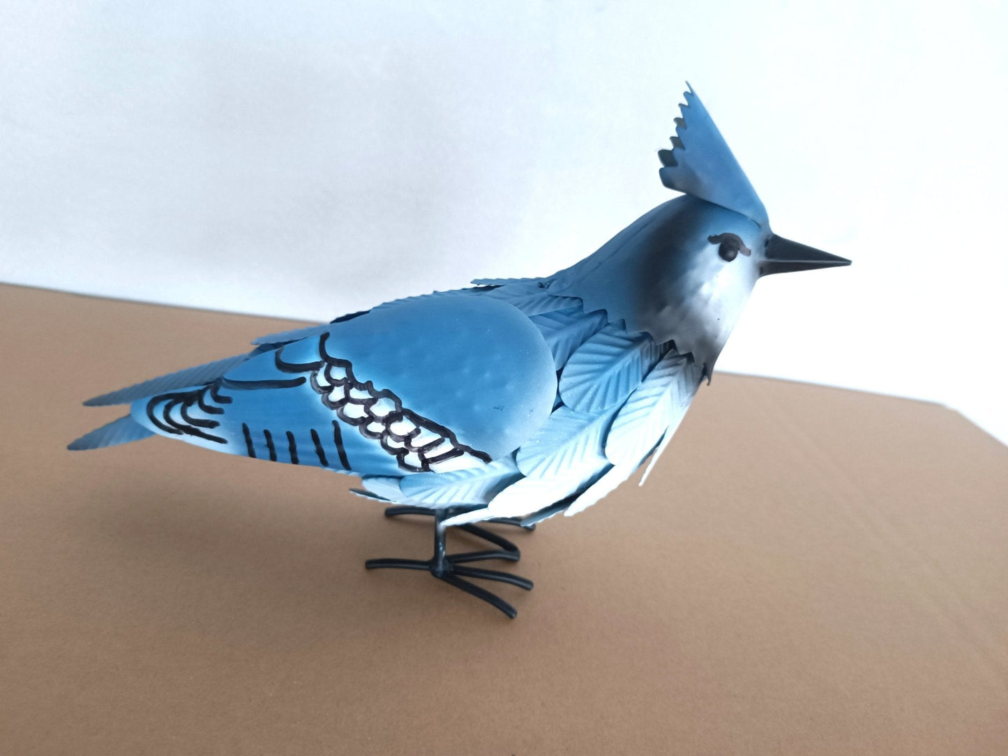 Red Cardinal Figurine: Red Metal Cardinal Garden Statue for Outdoor Yard Decoration

Blue Jay Figurine: Blue Metal Blue Jay Bird Sculpture – Outdoor Garden Art

Both Birds: Set of Metal Bird Yard Art Statues – Red Cardinal & Blue Jay

Close-ups: Close-Up View of Hand-Painted Outdoor Bird Figurines