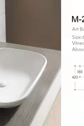Modern countertop bathroom sink basin in white ceramic
Above counter square vessel sink installed on wooden vanity
Bathroom vanity bowl with chrome faucet and soap dispenser
Dimensions of square countertop sink with standard drain hole
Side and top view of glossy white vessel sink for powder room
