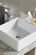 Modern countertop bathroom sink basin in white ceramic
Above counter square vessel sink installed on wooden vanity
Bathroom vanity bowl with chrome faucet and soap dispenser
Dimensions of square countertop sink with standard drain hole
Side and top view of glossy white vessel sink for powder room