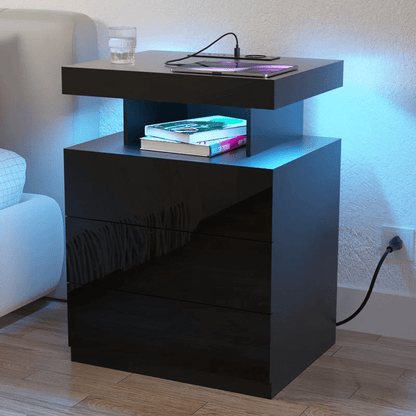White Modern Nightstand with LED Lights and Charging Ports

Black Nightstand with RGB Lighting in Bedroom Setup

Smart Nightstand with Glowing LED Drawers – White Finish

Compact Bedside Table with Built-In Outlets and Lights

Modern Nightstand with Power Outlets and Drawer Storage