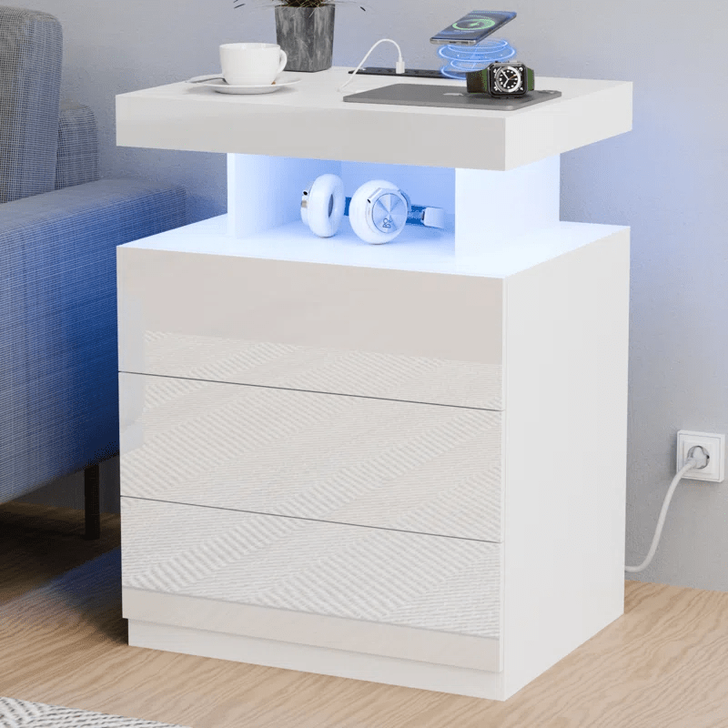 White Modern Nightstand with LED Lights and Charging Ports

Black Nightstand with RGB Lighting in Bedroom Setup

Smart Nightstand with Glowing LED Drawers – White Finish

Compact Bedside Table with Built-In Outlets and Lights

Modern Nightstand with Power Outlets and Drawer Storage

