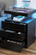 White Modern Nightstand with LED Lights and Charging Ports

Black Nightstand with RGB Lighting in Bedroom Setup

Smart Nightstand with Glowing LED Drawers – White Finish

Compact Bedside Table with Built-In Outlets and Lights

Modern Nightstand with Power Outlets and Drawer Storage