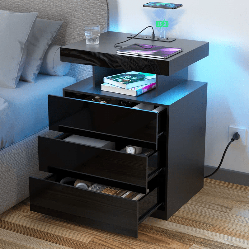 White Modern Nightstand with LED Lights and Charging Ports

Black Nightstand with RGB Lighting in Bedroom Setup

Smart Nightstand with Glowing LED Drawers – White Finish

Compact Bedside Table with Built-In Outlets and Lights

Modern Nightstand with Power Outlets and Drawer Storage