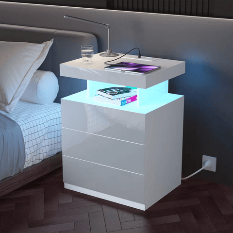 White Modern Nightstand with LED Lights and Charging Ports

Black Nightstand with RGB Lighting in Bedroom Setup

Smart Nightstand with Glowing LED Drawers – White Finish

Compact Bedside Table with Built-In Outlets and Lights

Modern Nightstand with Power Outlets and Drawer Storage