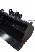 1 Ton Mini Excavator with red exterior and enclosed cab

Excavator attachments: auger, rake, ripper tooth

Briggs & Stratton engine close-up in compact excavator

Compact excavator operating on residential job site

Interior view of enclosed cab on mini excavator