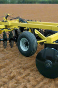 Yellow 10 ft offset disc harrow on field-ready tires
Side profile of 14 ft hydraulic disc harrow with black frame
17 ft disc harrow for large-scale farming operations
Rear angle of disc harrow showing disc blade spacing
Overhead view of disc harrow attachment connected to tractor