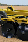 Yellow 10 ft offset disc harrow on field-ready tires
Side profile of 14 ft hydraulic disc harrow with black frame
17 ft disc harrow for large-scale farming operations
Rear angle of disc harrow showing disc blade spacing
Overhead view of disc harrow attachment connected to tractor