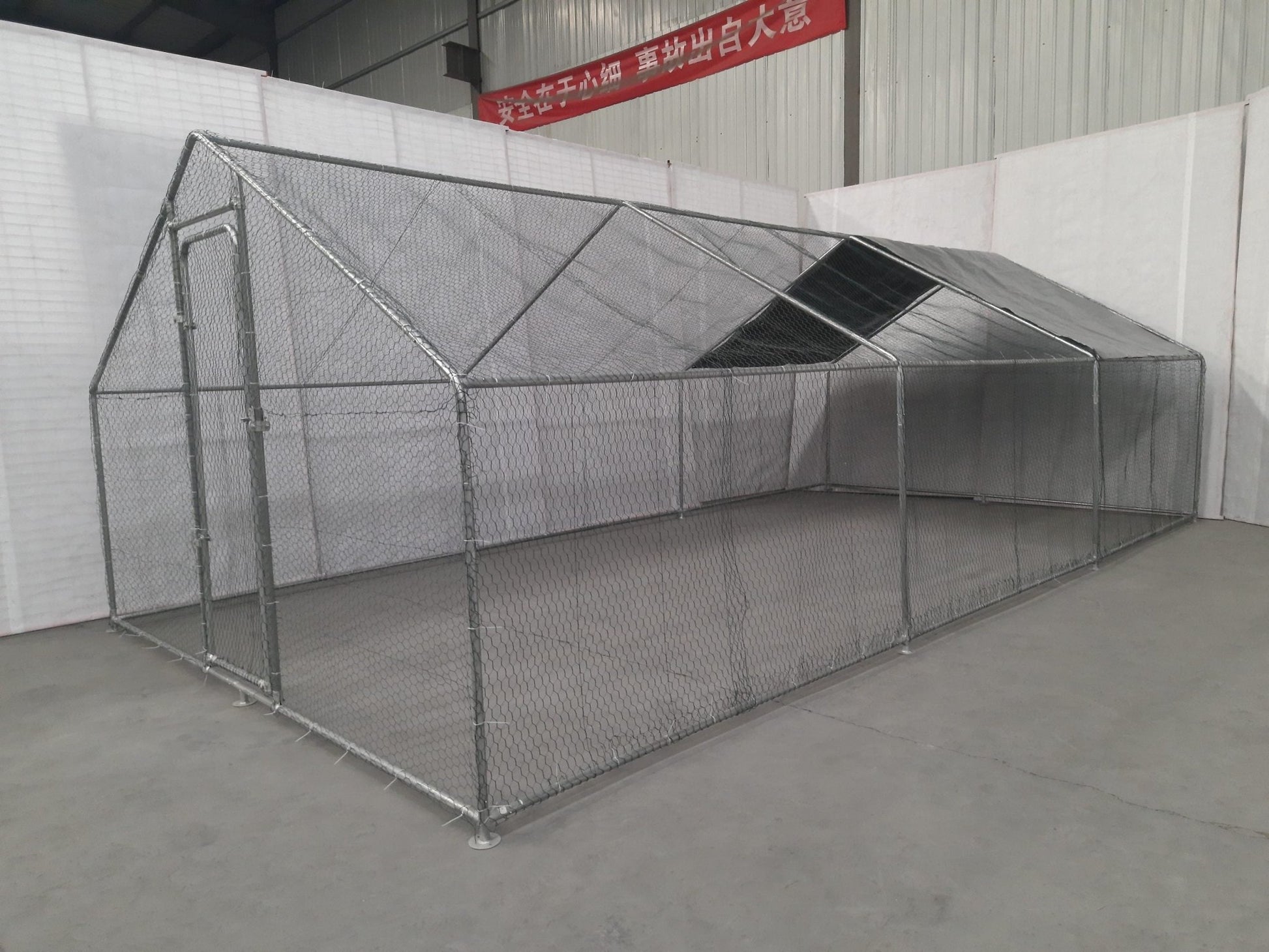 10x20 metal dog kennel cage with chicken wire fence

Walk-in outdoor animal enclosure for chickens or dogs

Backyard fenced compound with metal frame

Secure livestock pen with galvanized steel construction

Versatile pet and poultry cage outdoors