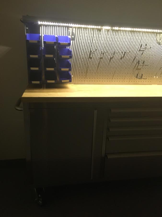 84" stainless steel tool bench with LED lighting and drawers

Solid wood top garage workbench with 11 storage drawers

Professional stainless steel tool station with LED bar

Close-up of drawer handles on heavy-duty tool bench

Industrial workbench with built-in lights and hardwood surface