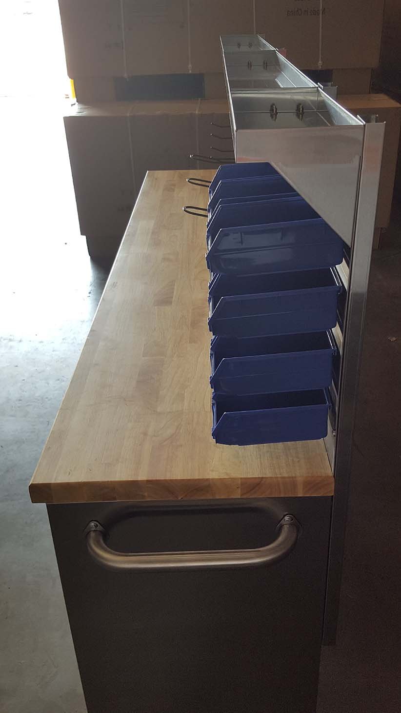 84" stainless steel tool bench with LED lighting and drawers

Solid wood top garage workbench with 11 storage drawers

Professional stainless steel tool station with LED bar

Close-up of drawer handles on heavy-duty tool bench

Industrial workbench with built-in lights and hardwood surface