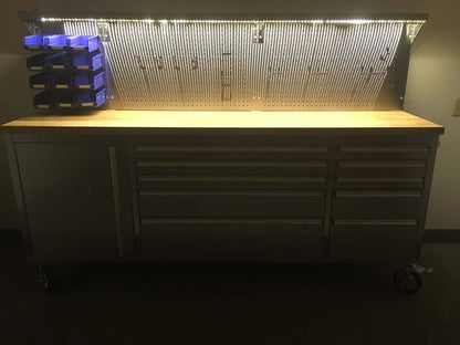 84" stainless steel tool bench with LED lighting and drawers

Solid wood top garage workbench with 11 storage drawers

Professional stainless steel tool station with LED bar

Close-up of drawer handles on heavy-duty tool bench

Industrial workbench with built-in lights and hardwood surface