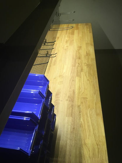 84" stainless steel tool bench with LED lighting and drawers

Solid wood top garage workbench with 11 storage drawers

Professional stainless steel tool station with LED bar

Close-up of drawer handles on heavy-duty tool bench

Industrial workbench with built-in lights and hardwood surface