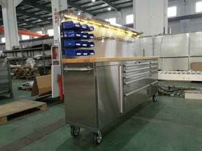 84" stainless steel tool bench with LED lighting and drawers

Solid wood top garage workbench with 11 storage drawers

Professional stainless steel tool station with LED bar

Close-up of drawer handles on heavy-duty tool bench

Industrial workbench with built-in lights and hardwood surface