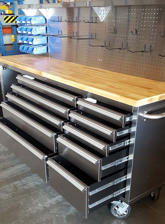 84" stainless steel tool bench with LED lighting and drawers

Solid wood top garage workbench with 11 storage drawers

Professional stainless steel tool station with LED bar

Close-up of drawer handles on heavy-duty tool bench

Industrial workbench with built-in lights and hardwood surface