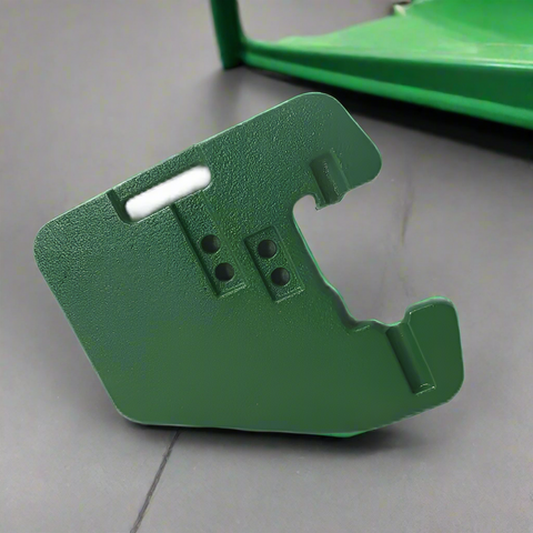 110 lb green suitcase front weight for John Deere
Close-up view of R116262 replacement tractor weight
Angled image of John Deere compatible suitcase weight
Mounted example of 110 lb tractor front weight
Side profile of green cast iron suitcase weight