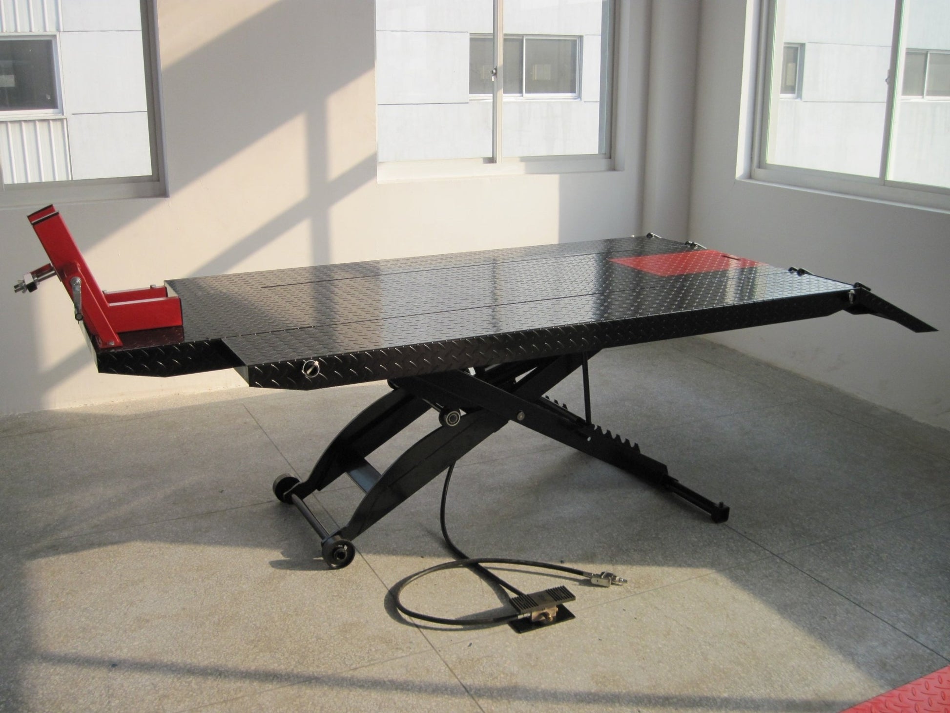 “1100 LB air-operated scissor lift for motorcycles”

“Hydraulic ATV lift with ramp and side extensions”

“Garage motorcycle lift with rear wheel access”

“Heavy-duty air-powered scissor hoist for bikes”

“Hydraulic scissor lift platform with ramp”