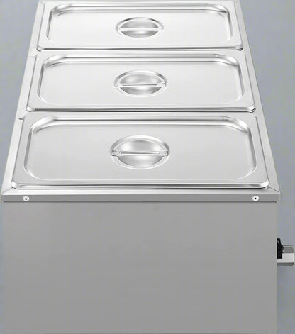 3-pan buffet food warmer front view with lid open

Commercial food warmer showing stainless steel interior

Temperature knob and heating element close-up

Buffet setup with food in all three compartments

Side view of removable pans with food steam