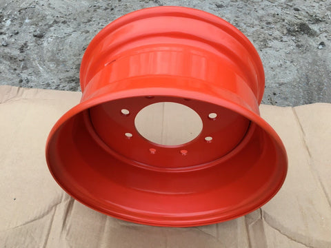 Red steel skid steer rim 9.75x16.5
8-lug Bobcat compatible wheel
Skid steer wheel for 12x16.5 tire
Red 16.5" rim for construction equipment
Heavy-duty skid steer wheel close-up
