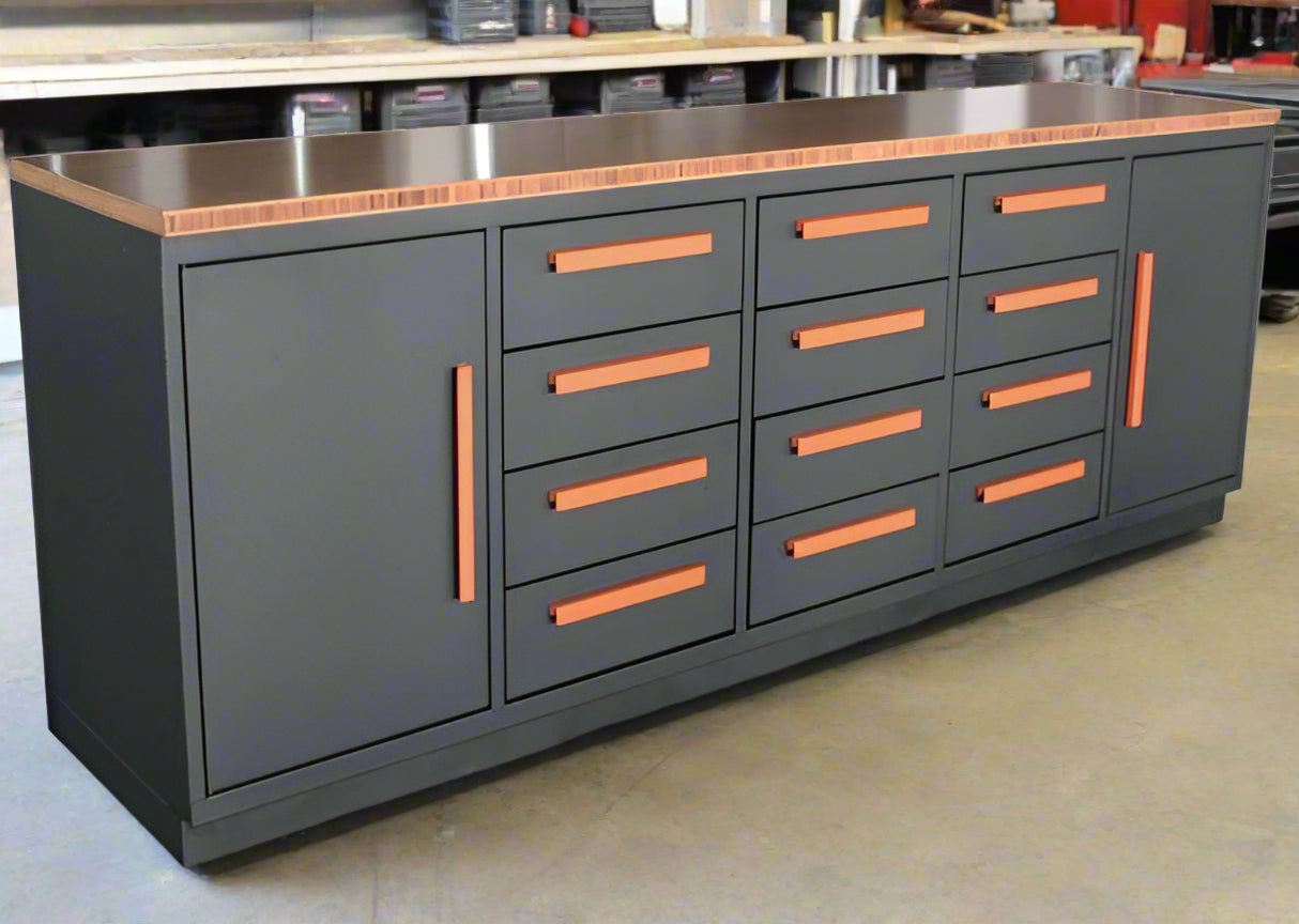 Heavy-duty steel workbench with 12 drawers and 2 cabinets – front view
Red metal tool storage bench for garage or workshop use
Industrial-grade 12-drawer workbench with welded backsplash