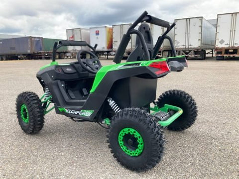 Front view of 1200W 48V Electric Go Kart UTV in green with roll cage

Side view showing suspension and knobby tires

Red electric off-road buggy for youth

Adjustable racing seat with seatbelt

Rear motor and chain drive close-up

Hydraulic disc brakes and rear suspension

Dual color variants: red and green off-road karts