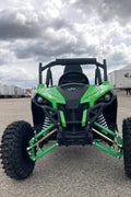 Front view of 1200W 48V Electric Go Kart UTV in green with roll cage

Side view showing suspension and knobby tires

Red electric off-road buggy for youth

Adjustable racing seat with seatbelt

Rear motor and chain drive close-up

Hydraulic disc brakes and rear suspension

Dual color variants: red and green off-road karts