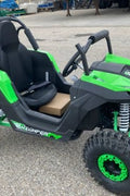 Front view of 1200W 48V Electric Go Kart UTV in green with roll cage

Side view showing suspension and knobby tires

Red electric off-road buggy for youth

Adjustable racing seat with seatbelt

Rear motor and chain drive close-up

Hydraulic disc brakes and rear suspension

Dual color variants: red and green off-road karts