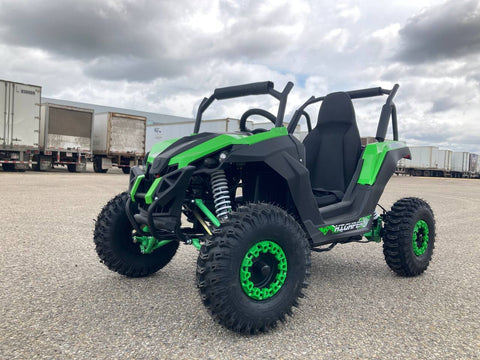 Front view of 1200W 48V Electric Go Kart UTV in green with roll cage

Side view showing suspension and knobby tires

Red electric off-road buggy for youth

Adjustable racing seat with seatbelt

Rear motor and chain drive close-up

Hydraulic disc brakes and rear suspension

Dual color variants: red and green off-road karts