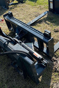 Rotating hydraulic skid steer pallet fork with 42” tines

HRB11172A attachment showing 127° rotation

Heavy-duty quick attach pallet forks for skid steer

Close-up of reinforced steel fork frame

Rotating fork in lifted pallet position on gravel site