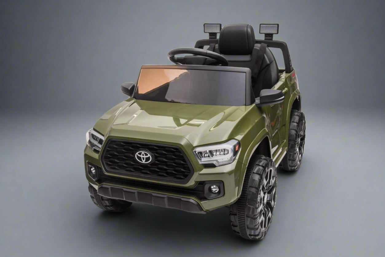 Olive green Toyota-style ride-on pickup truck for kids

Side view of remote-control kids truck with leather seat

Child’s electric ride-on truck with LED headlights

Toyota ride-on truck in olive green with suspension

Battery-powered pickup truck for toddlers