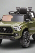 Olive green Toyota-style ride-on pickup truck for kids

Side view of remote-control kids truck with leather seat

Child’s electric ride-on truck with LED headlights

Toyota ride-on truck in olive green with suspension

Battery-powered pickup truck for toddlers