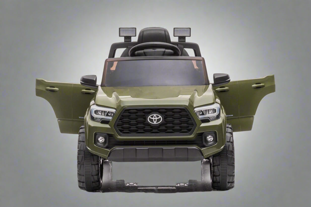 Olive green Toyota-style ride-on pickup truck for kids

Side view of remote-control kids truck with leather seat

Child’s electric ride-on truck with LED headlights

Toyota ride-on truck in olive green with suspension

Battery-powered pickup truck for toddlers
