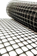 BX131X164 biaxial geogrid roll for soil reinforcement
Geogrid mesh for road base construction
Heavy-duty bidirectional geogrid unrolled on gravel
Close-up of high-tensile geogrid fabric