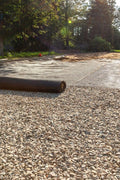 BX131X164 biaxial geogrid roll for soil reinforcement
Geogrid mesh for road base construction
Heavy-duty bidirectional geogrid unrolled on gravel
Close-up of high-tensile geogrid fabric