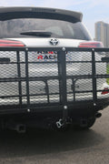 Steel cargo platform rack attached to vehicle rear hitch