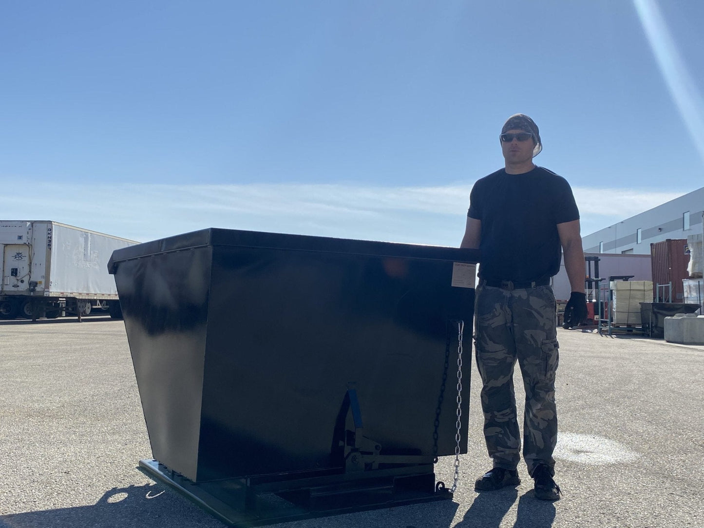 "Standard duty black forklift dump hopper in outdoor warehouse"

"Heavy-duty red tip bin hopper forklift compatible"

"Industrial forklift hopper with automatic bumper release"

"3 cubic yard black steel dump bin"

"Heavy-duty forklift tipping hopper with reinforced frame"