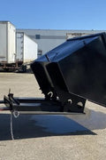 "Standard duty black forklift dump hopper in outdoor warehouse"

"Heavy-duty red tip bin hopper forklift compatible"

"Industrial forklift hopper with automatic bumper release"

"3 cubic yard black steel dump bin"

"Heavy-duty forklift tipping hopper with reinforced frame"