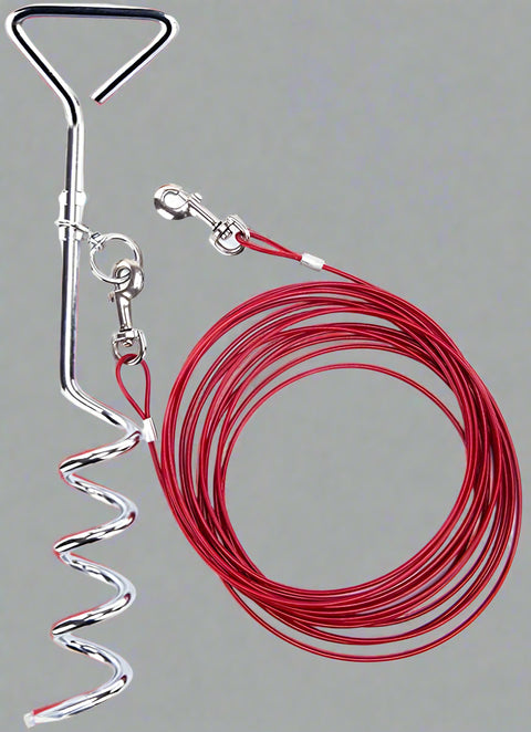 Red tie-out cable and spiral stake set for dogs
Close-up of spiral dog stake with cable
Plastic-coated steel dog leash cable
Dog tie-out cable in coiled position
Outdoor use of tie-out cable with dog