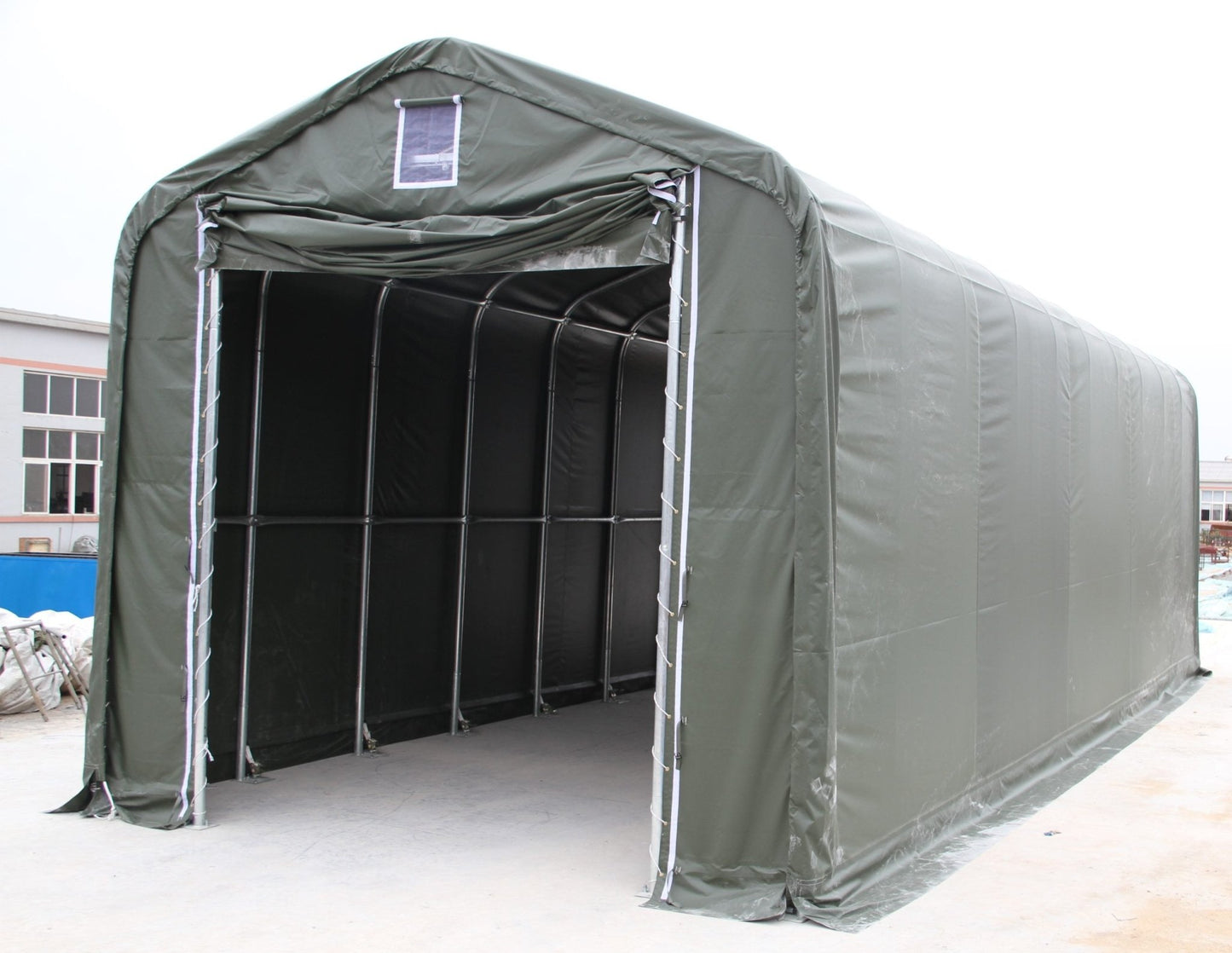 Heavy-duty PVC truck shelter with open front for easy vehicle access